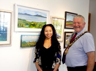 The Mayor of Causeway Coast and Glens Borough Council Councillor Ivor Wallace pictured with Arts and Cultural Facilities Officer Esther Alleyne during his recent visit to Roe Valley Arts and Cultural Centre.