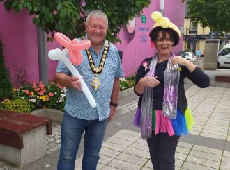 Mayor Ivor Wallace with Kate the Balloon Modeler at August Children's Month